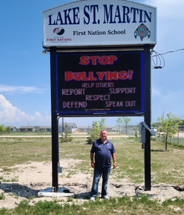 Digital messaging board along the roadside at the Lake St. Martin First Nation School.
